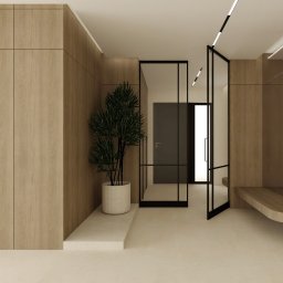 Kinga Juryś Projekty Wnętrz - Nowoczesny przedpokój z drewnianą zabudową, rośliną w donicy i szklanymi drzwiami. Minimalistyczne oświetlenie punktowe i ławka wkomponowana w ścianę.