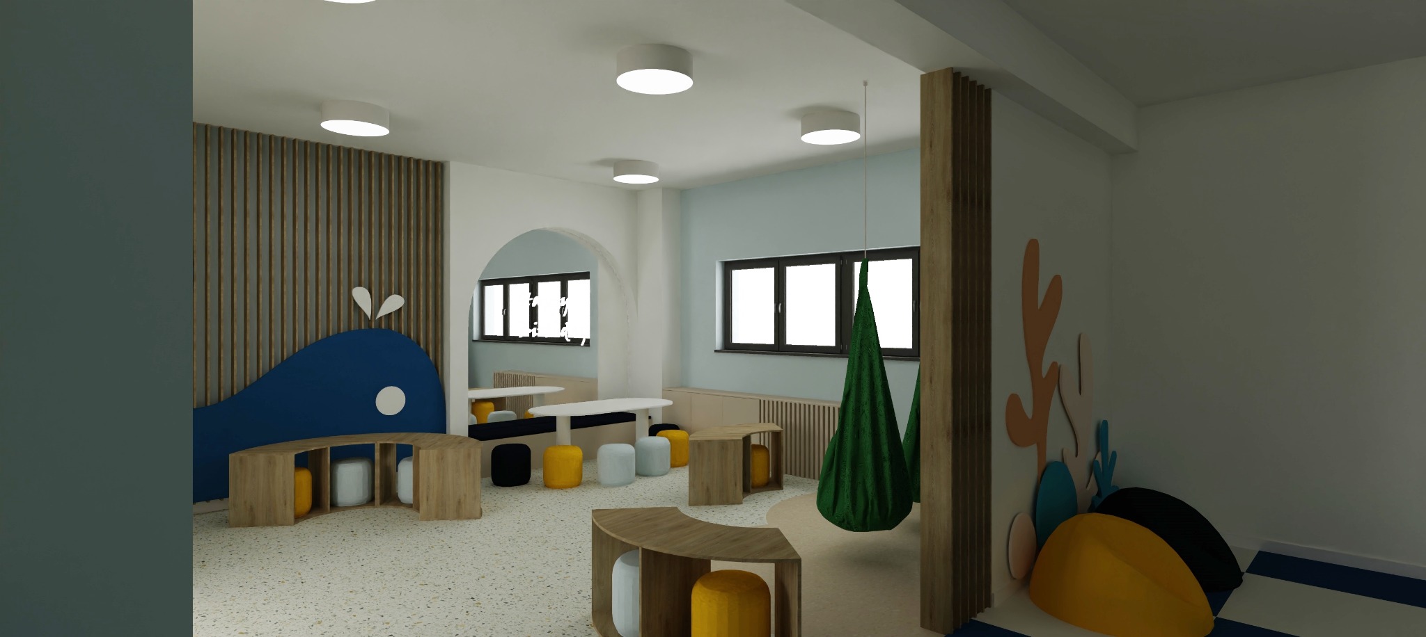 Wnętrze pokoju dziecięcego z motywem morskim: drewniane panele, niebieski wieloryb, kolorowe pufy i wiszące siedzisko. Jasne, przestronne pomieszczenie z oknami.