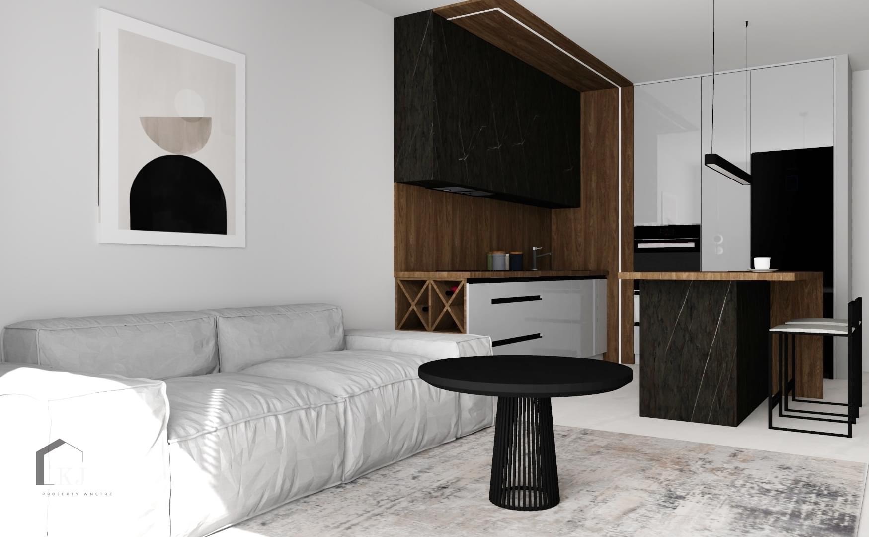Wizualizacja salonu z aneksem kuchennym w nowoczesnym stylu, z szarą sofą, czarnym stolikiem kawowym i zabudową kuchenną z elementami drewna i czarnego marmuru.