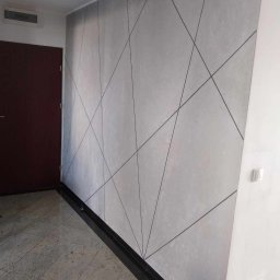 Beton Architektoniczny nada ścianą wyrafinowanego wykończenia 