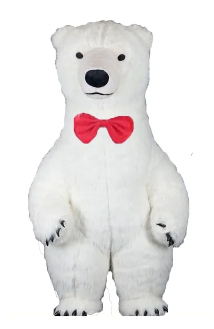 Biały, pluszowy kostium niedźwiedzia polarnego z czerwoną muchą, stojący na białym tle.