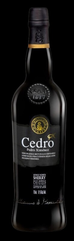 Butelka ciemnego sherry Pedro Ximénez Cedro na czarnym tle, z widocznymi tłoczeniami na szkle i etykiecie w odcieniach złota i bieli.