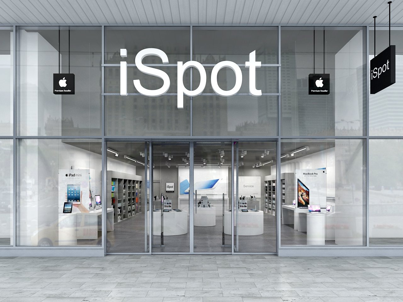 Elewacja sklepu iSpot z dużym logo na witrynie, widoczne ekspozycje iPad mini i MacBook Pro, oraz wiszące szyldy Premium Reseller.