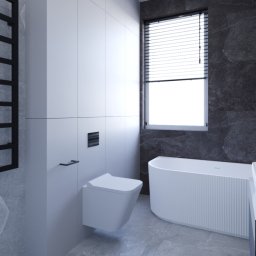 ZEBRA studio - Nowoczesna łazienka w szarościach z podwieszaną toaletą, wolnostojącą wanną i grzejnikiem drabinkowym.