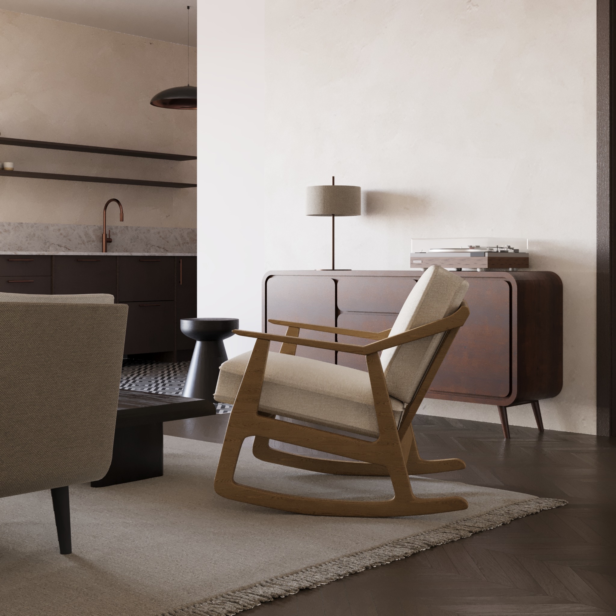 Nowoczesny salon z drewnianym fotelem bujanym, komodą w stylu retro z gramofonem i lampą, widok na kuchnię z marmurowym blatem i czarno-białą podłogą.