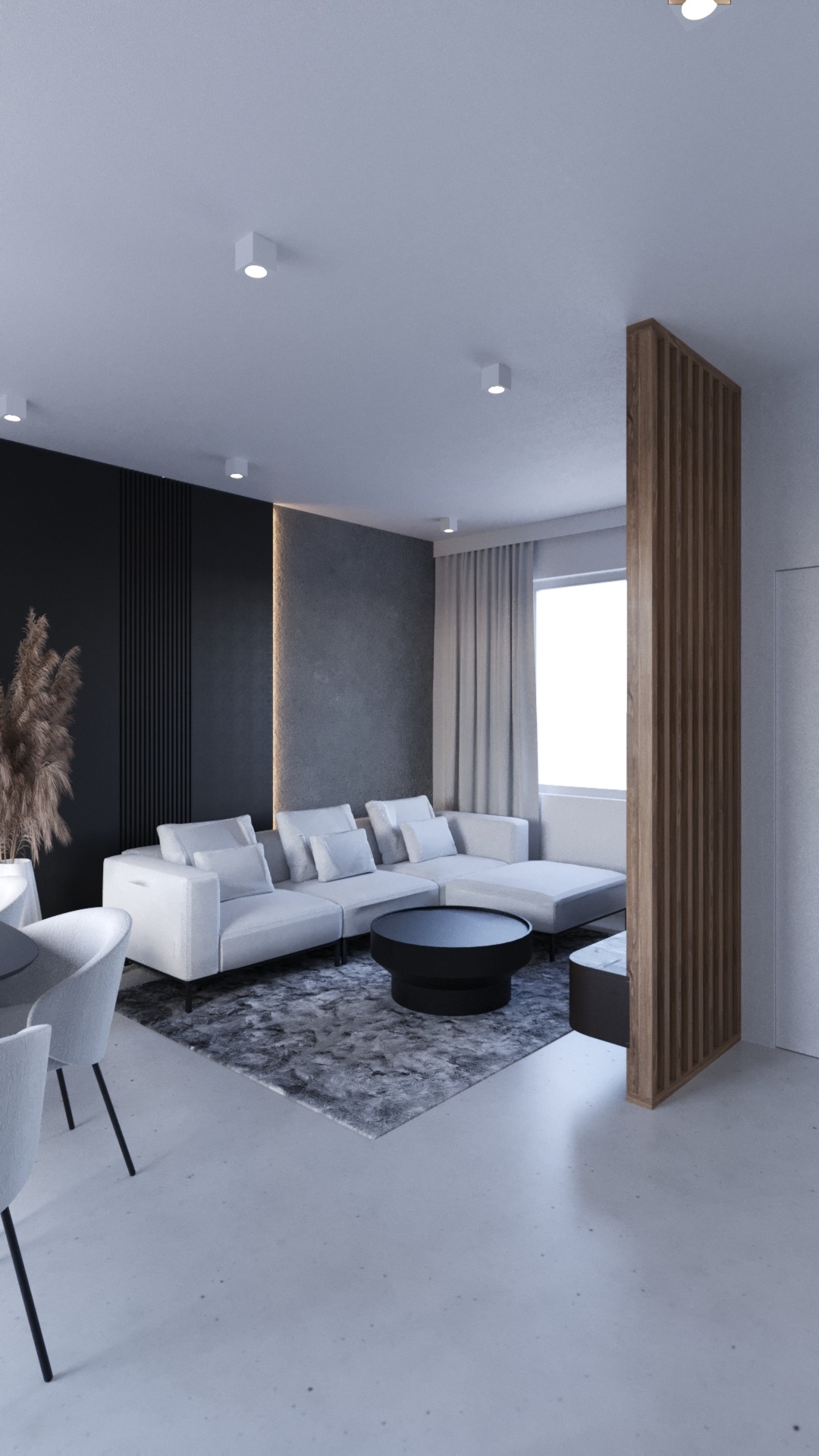 Nowoczesny salon z narożną sofą, czarnym stolikiem kawowym i panelami dekoracyjnymi na ścianie, oświetlony punktowymi lampami sufitowymi.