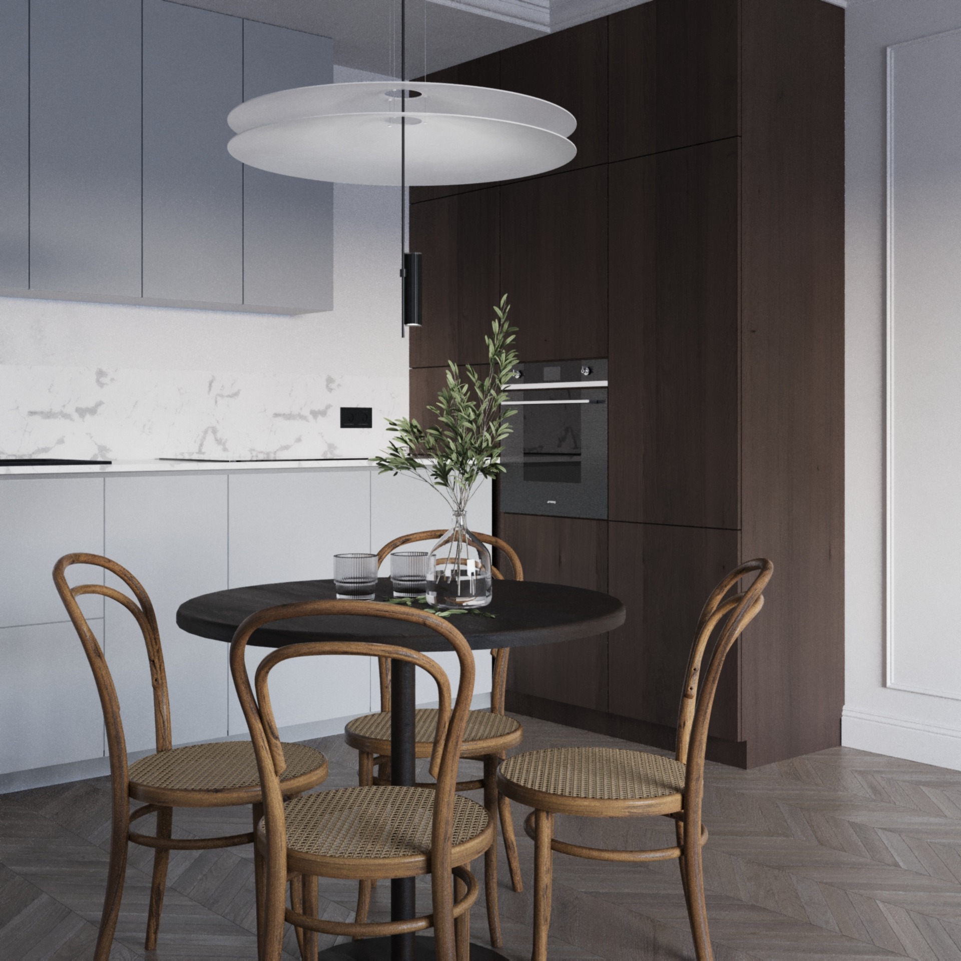 Nowoczesna kuchnia z okrągłym, czarnym stołem i czterema krzesłami z giętego drewna z rattanowym siedziskiem, uzupełniona minimalistyczną lampą wiszącą i dekoracyjnym bukietem w szklanym wazonie.