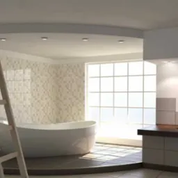 Wnętrze łazienki w trakcie prac wykończeniowych, widoczna drabina malarska, wanna wolnostojąca i fragment zabudowy umywalkowej, jasne płytki na ścianach i podłodze.