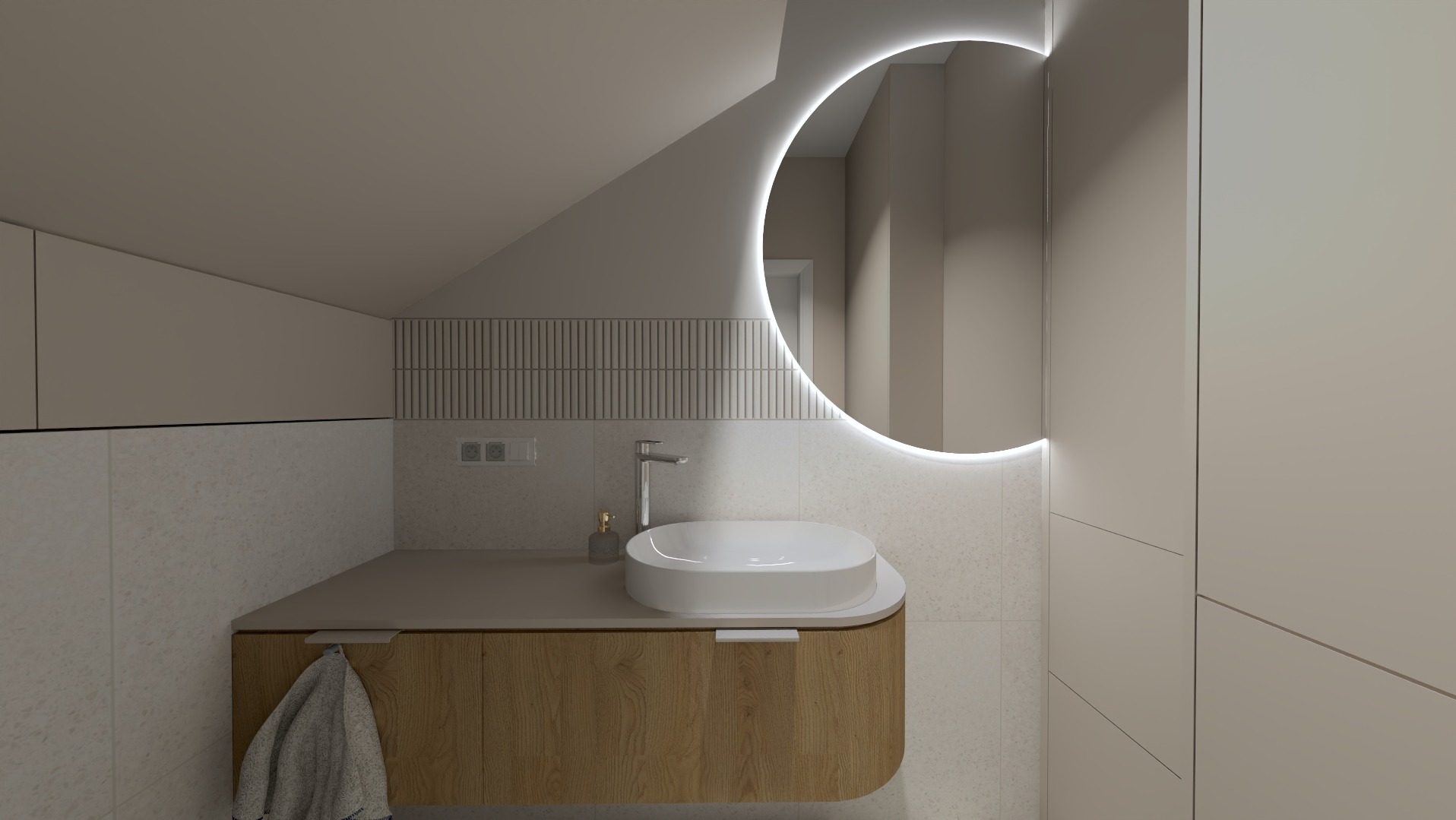 Nowoczesna łazienka na poddaszu z owalną umywalką nablatową, podświetlanym lustrem i drewnianą szafką pod umywalką. Widoczne płytki w odcieniach beżu i szarości oraz grzejnik dekoracyjny.