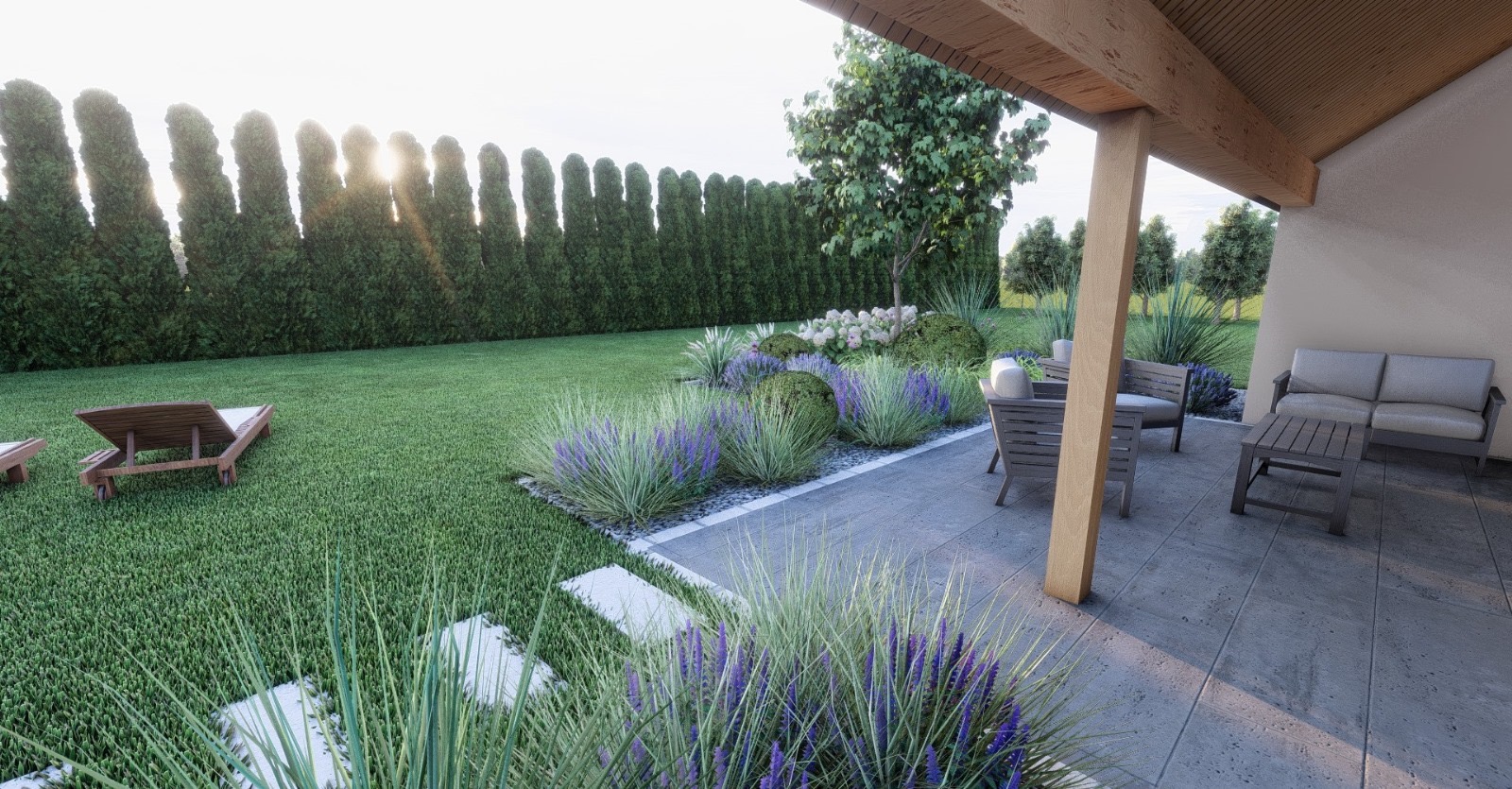Nowoczesny ogród z tarasem i leżakami, geometryczne rabaty z lawendą i ozdobnymi trawami, żywopłot z wysokich tuj w tle.
