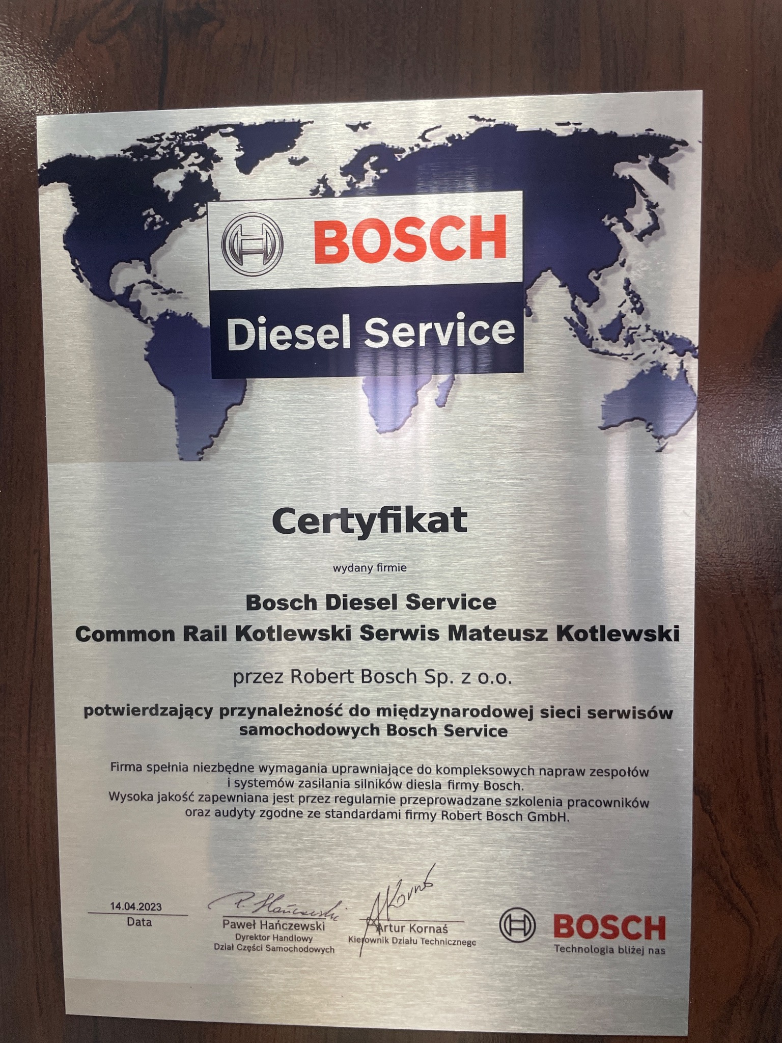 Certyfikat Bosch Diesel Service dla Common Rail Kotlewski Serwis Mateusz Kotlewski, potwierdzający przynależność do międzynarodowej sieci serwisów samochodowych Bosch Service, z podpisami i datą 14...