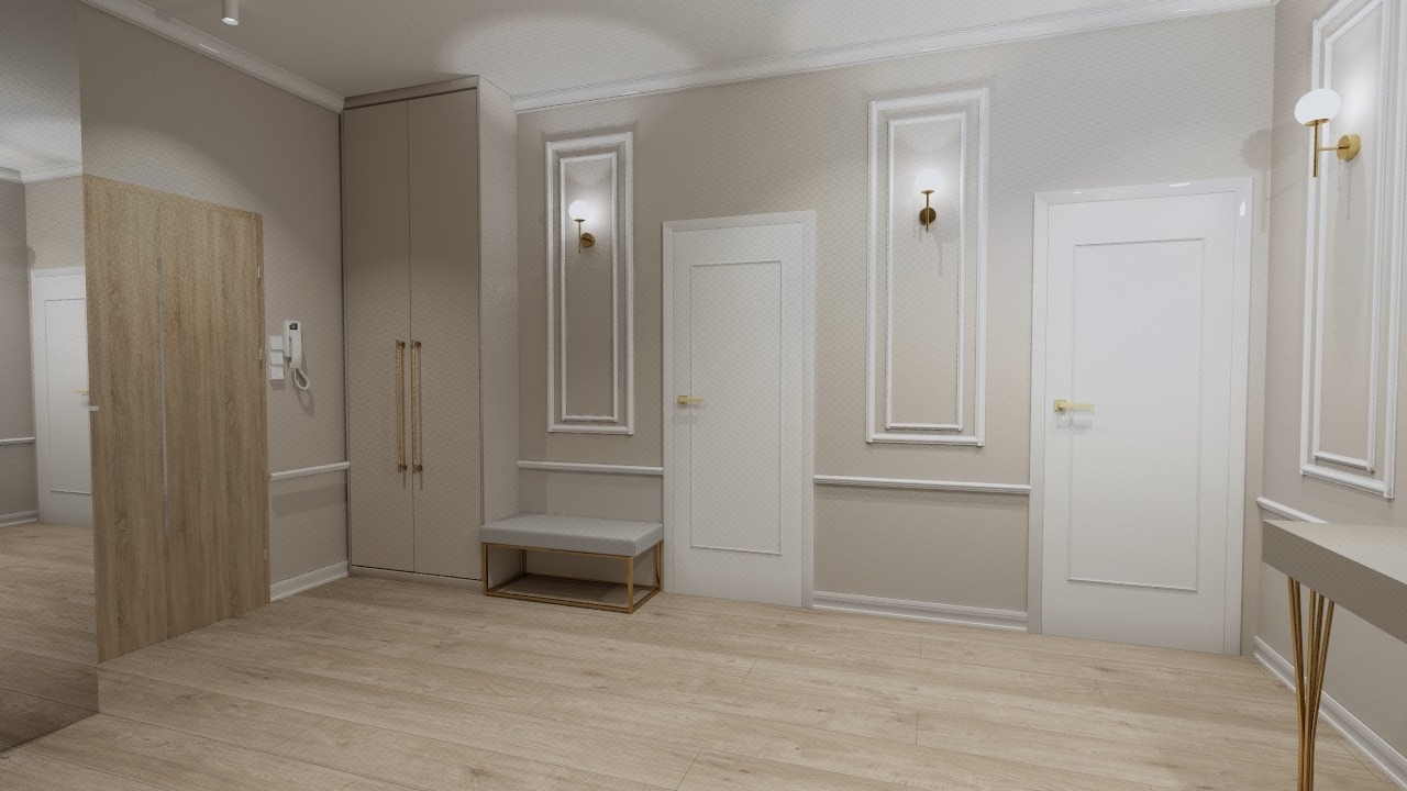 Elegancki przedpokój w jasnych barwach z panelami podłogowymi, białymi drzwiami z dekoracyjnymi listwami, szafą w zabudowie, siedziskiem i złotymi akcentami oświetleniowymi.