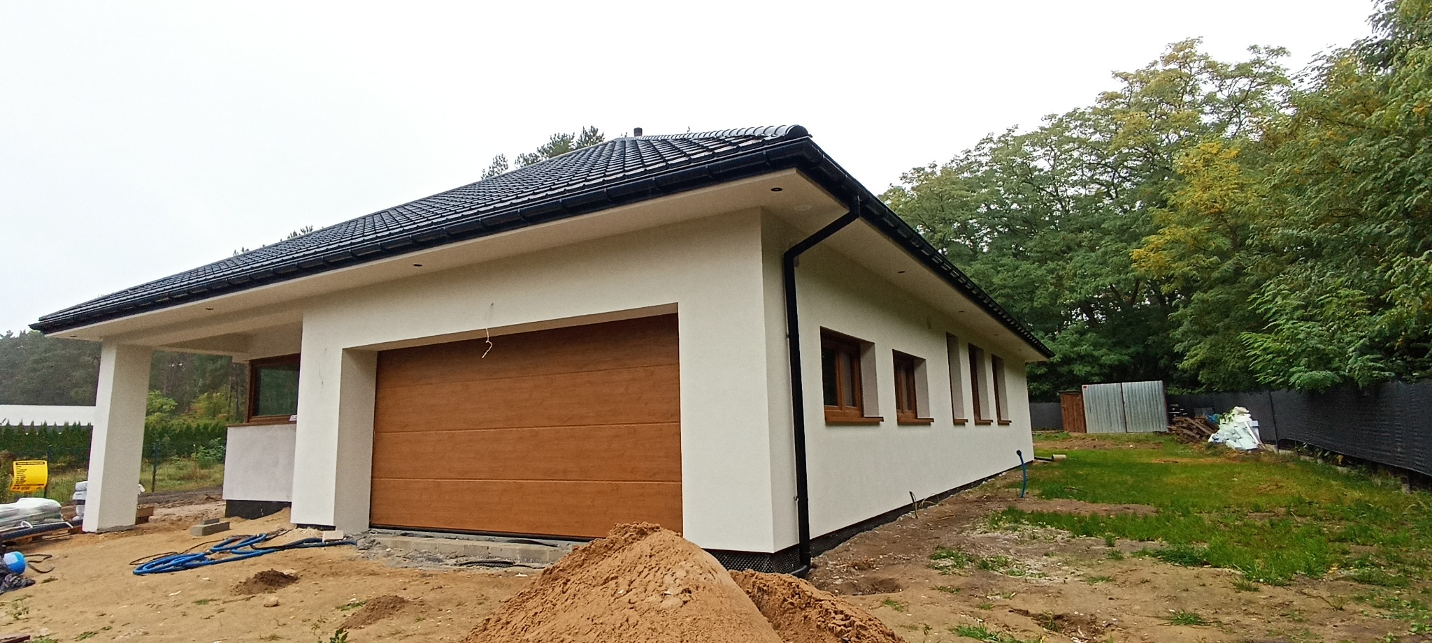 Wykonanie docieplenia, struktury +podbitka w tynku wszystko razem z materiałami:)