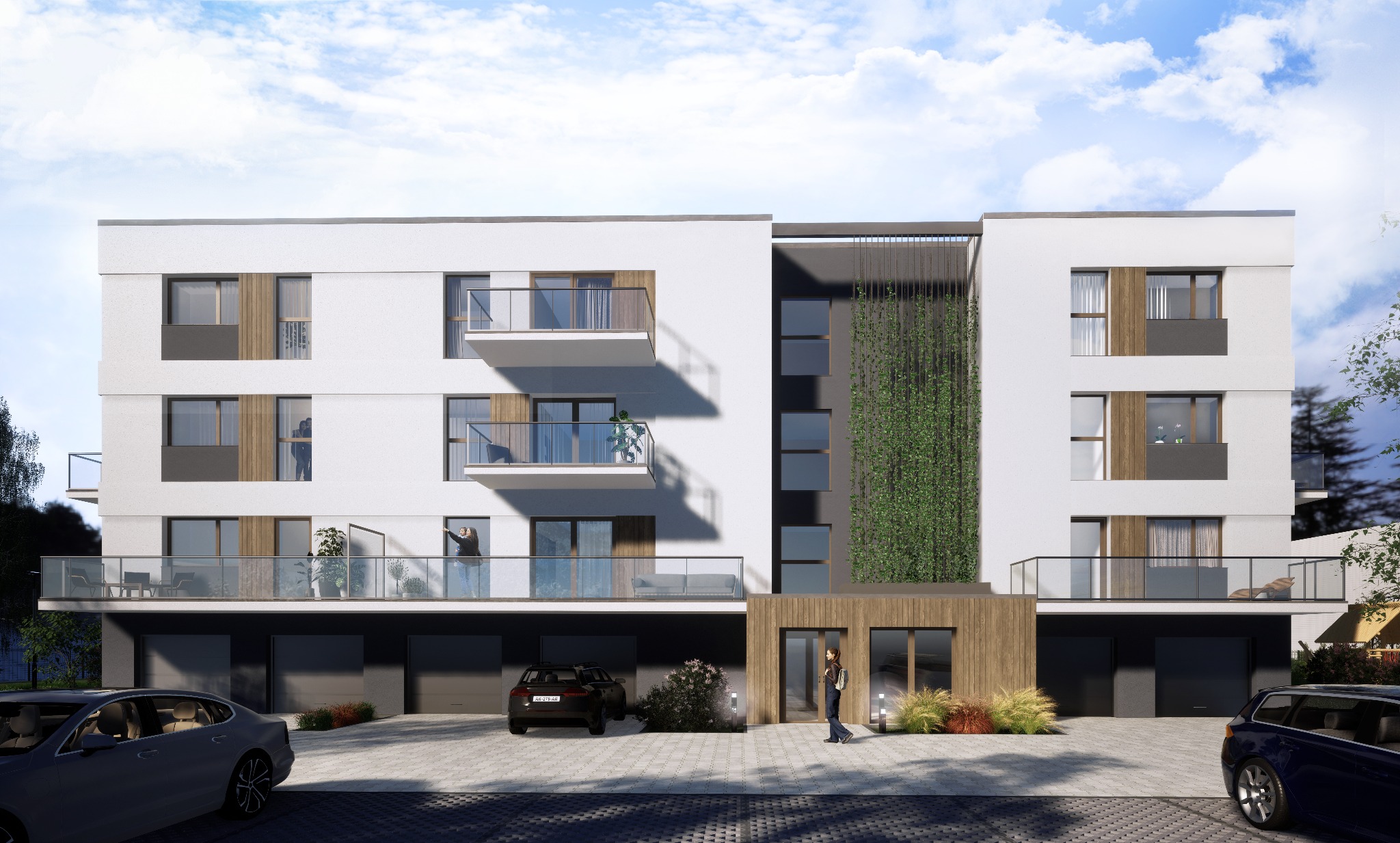Wizualizacja nowoczesnego, trzypiętrowego budynku mieszkalnego z balkonami i garażami, z elewacją w odcieniach bieli, szarości i drewna, oraz pionową zielenią na jednej ze ścian.