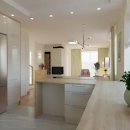 Nowoczesna, otwarta kuchnia z białymi szafkami, szarym blatem i wyspą, z widokiem na salon z kominkiem i jasnymi zasłonami, oświetlona światłem dziennym wpadającym przez duże okno z roślinami...