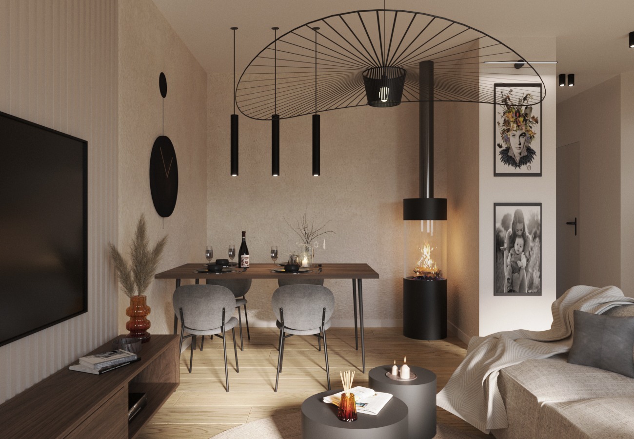 Wnętrze mieszkania z jadalnią, kominkiem w szklanej obudowie, okrągłym zegarem na ścianie i nowoczesnym oświetleniem wiszącym.