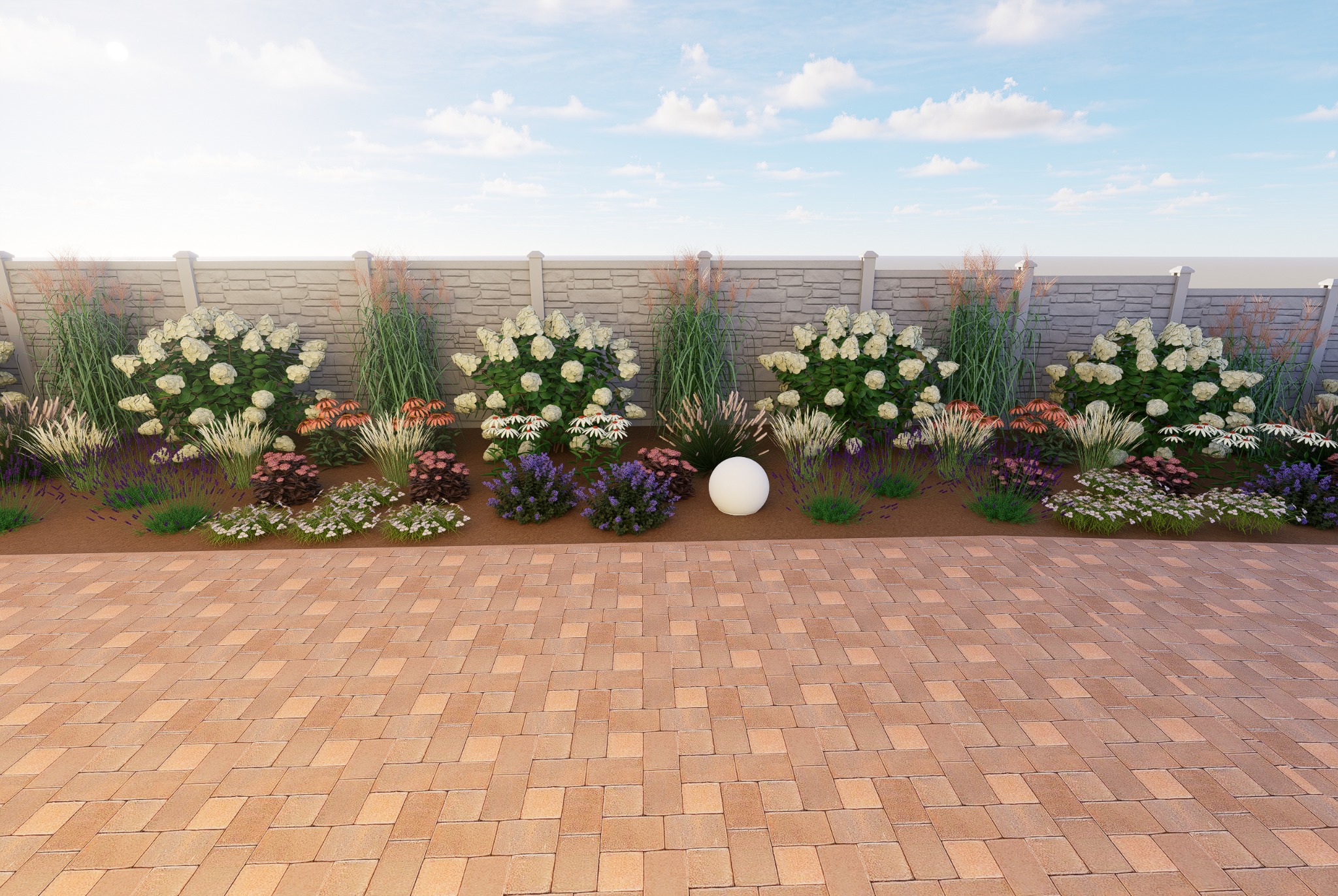 Kwitnący ogród z białymi hortensjami, rudbekiami i lawendą wzdłuż kamiennego muru, z oświetloną kulą dekoracyjną na tle kostki brukowej.