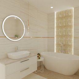 Kremowa łazienka z wanną wolnostojącą to oaza elegancji. Kolor ścian nadaje pomieszczeniu delikatności i przytulności, tworząc atmosferę relaksu. Głównym punktem łazienki jest imponująca, biała wanna wolnostojąca, która dodaje charakteru i luksusu.
