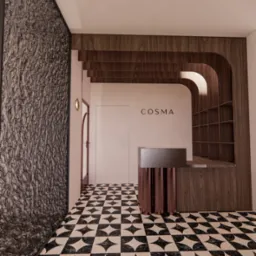 Recepcja w nowoczesnym salonie: czarno-biała podłoga w geometryczny wz&oacute;r, ściana z fakturą, drewniana zabudowa z p&oacute;łkami i logo 'COSMA' na ścianie.