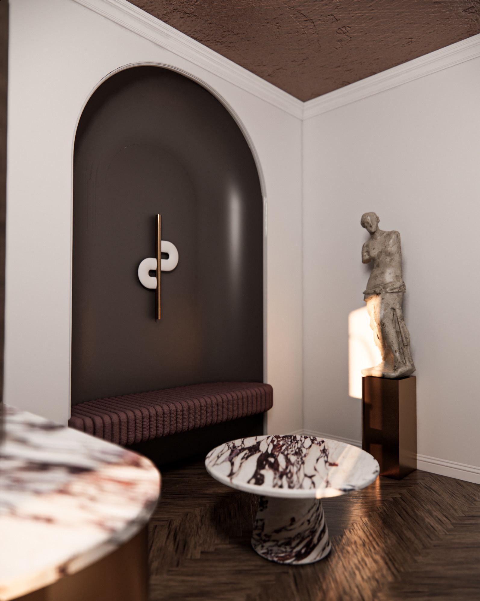 Wnętrze pokoju z wnęką z siedziskiem, marmurowymi stolikami kawowymi i rzeźbą na postumencie, oświetlone ciepłym światłem.