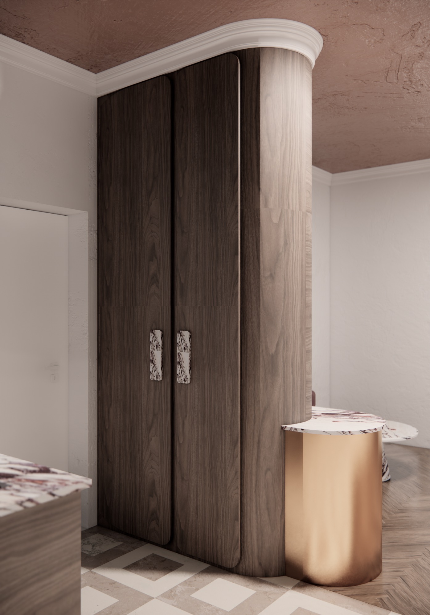 Nowoczesna szafa z ciemnego drewna z marmurowymi uchwytami, obok złota kolumna z marmurowym blatem, na podłodze wzór geometryczny.