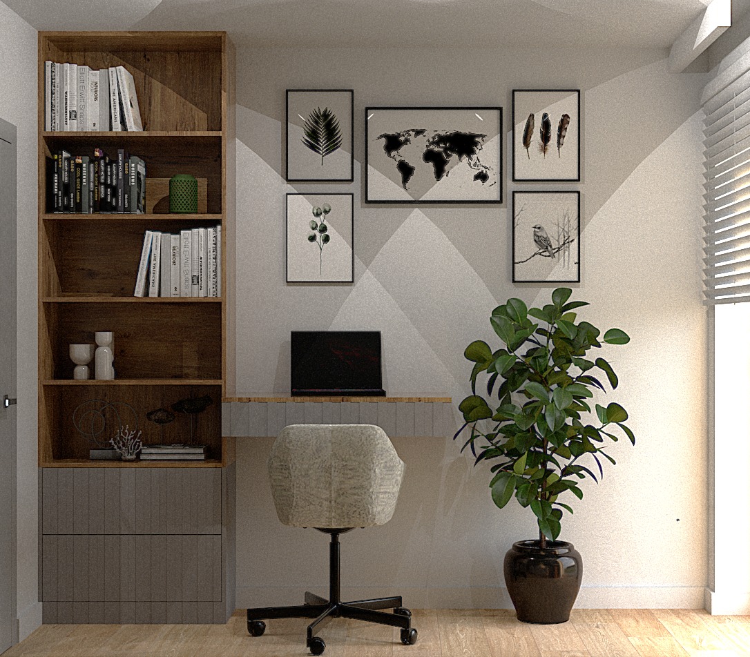 Aranżacja domowego biura w Oświęcimiu: drewniany regał z książkami, biurko z laptopem, krzesło na kółkach i duża roślina doniczkowa na tle ściany z grafikami w czarnych ramkach.