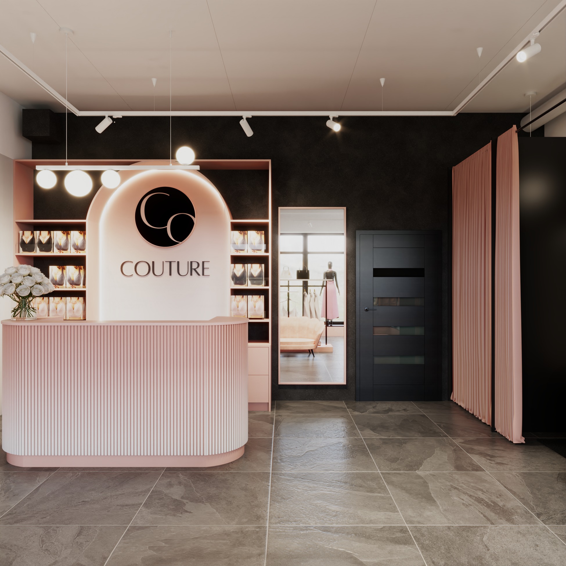 Nowoczesne wnętrze butiku odzieżowego z różową ladą recepcyjną i elementami dekoracyjnymi, widok na przymierzalnię i lustro z odbiciem ekspozycji ubrań.