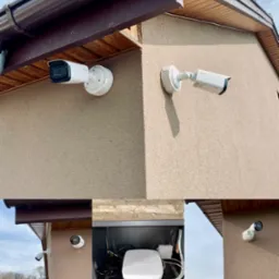 Dwie kamery monitoringu Dahua zamontowane na elewacji budynku o beżowej strukturze, widoczny brązowy system rynnowy i skrzynka z urządzeniami sieciowymi wewnątrz.