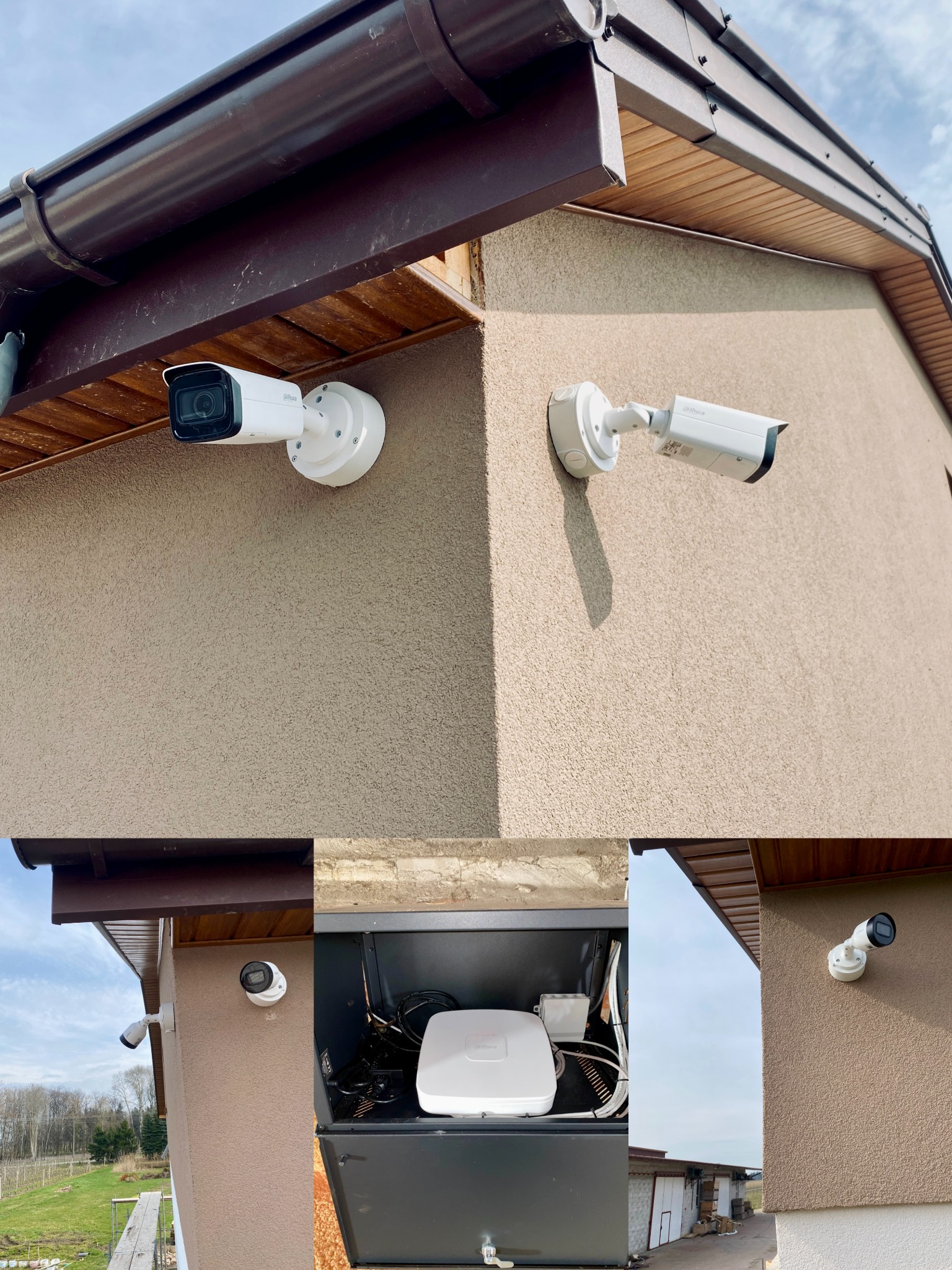 Dwie kamery monitoringu Dahua zamontowane na elewacji budynku o beżowej strukturze, widoczny brązowy system rynnowy i skrzynka z urządzeniami sieciowymi wewnątrz.