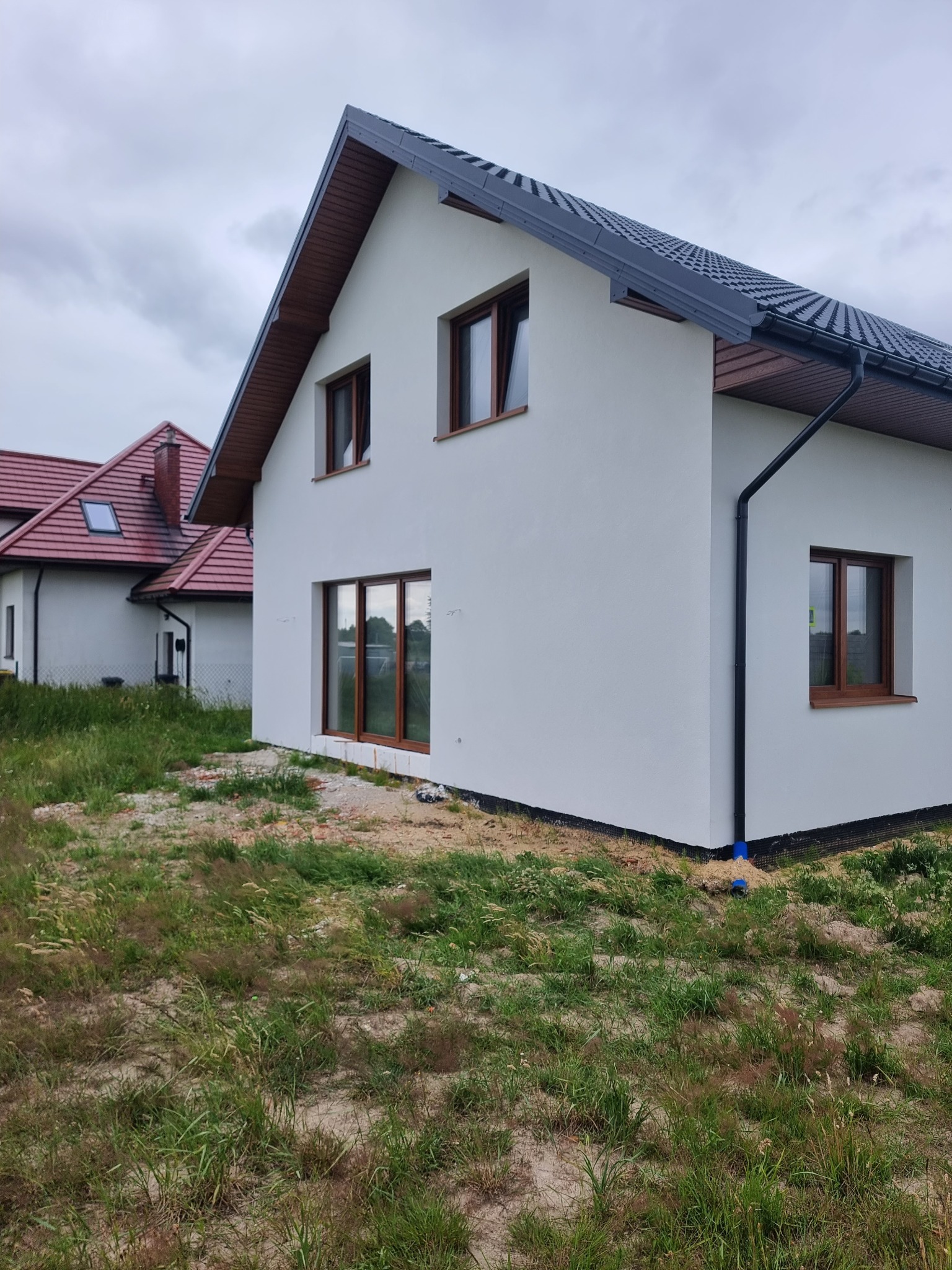 Wykonanie docieplenia+podbitka.