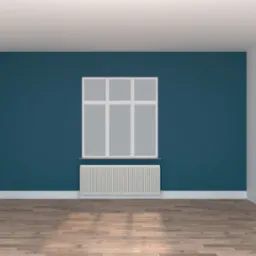 Pusty pokój z drewnianą podłogą, pomalowaną na biało ścianą i jedną ścianą w kolorze ciemnego turkusu, białe okno z grzejnikiem pod spodem.