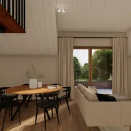 Wnętrze domu z ceglaną ścianą, drewnianymi schodami spiralnymi, okrągłym stołem jadalnym z czarnymi krzesłami, beżową sofą i dużym oknem balkonowym z widokiem na zieleń.