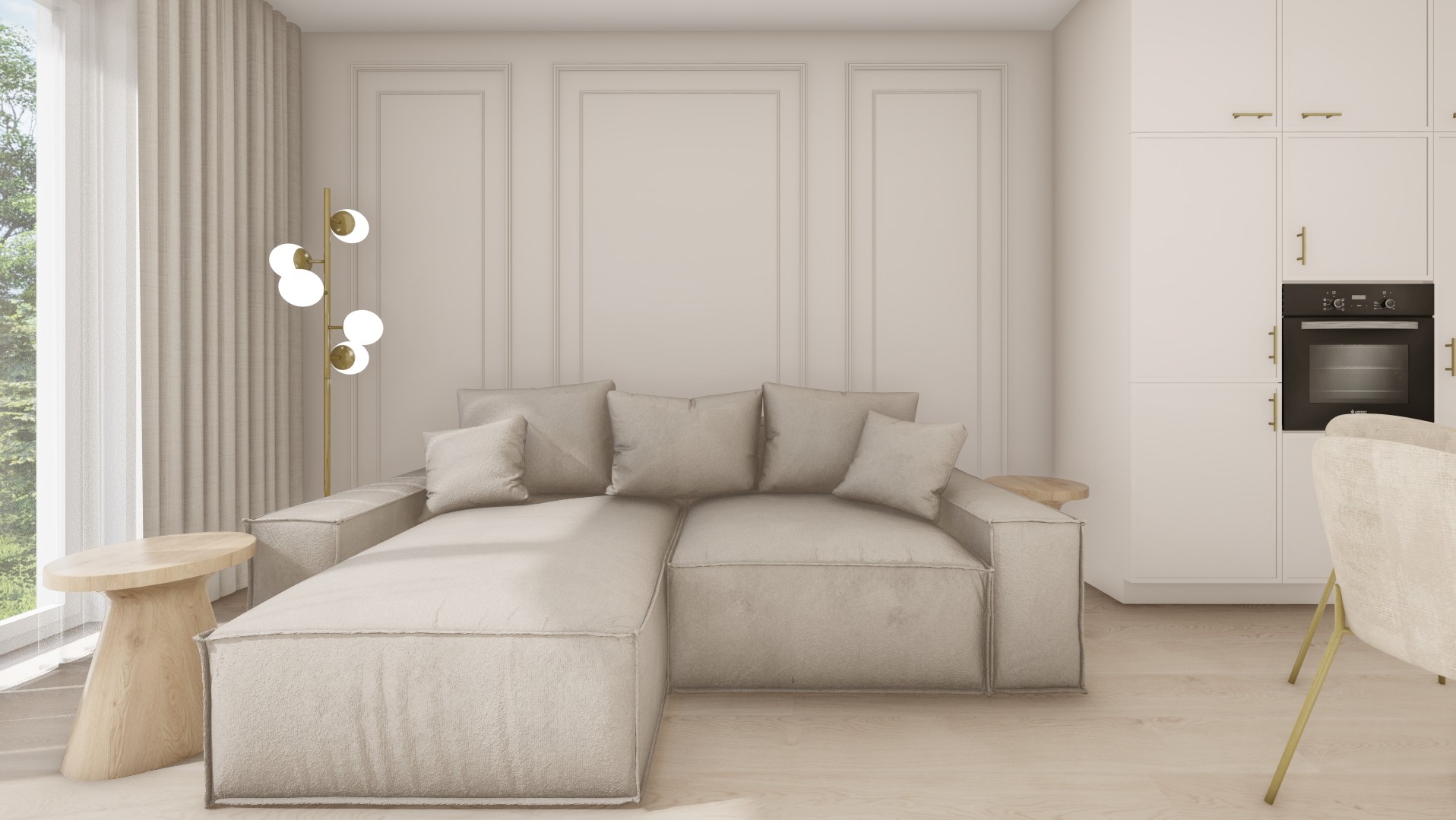 Jasne wnętrze salonu z narożną sofą, lampą podłogową z kulistymi kloszami, drewnianym stolikiem kawowym i białymi szafkami kuchennymi z piekarnikiem w tle.