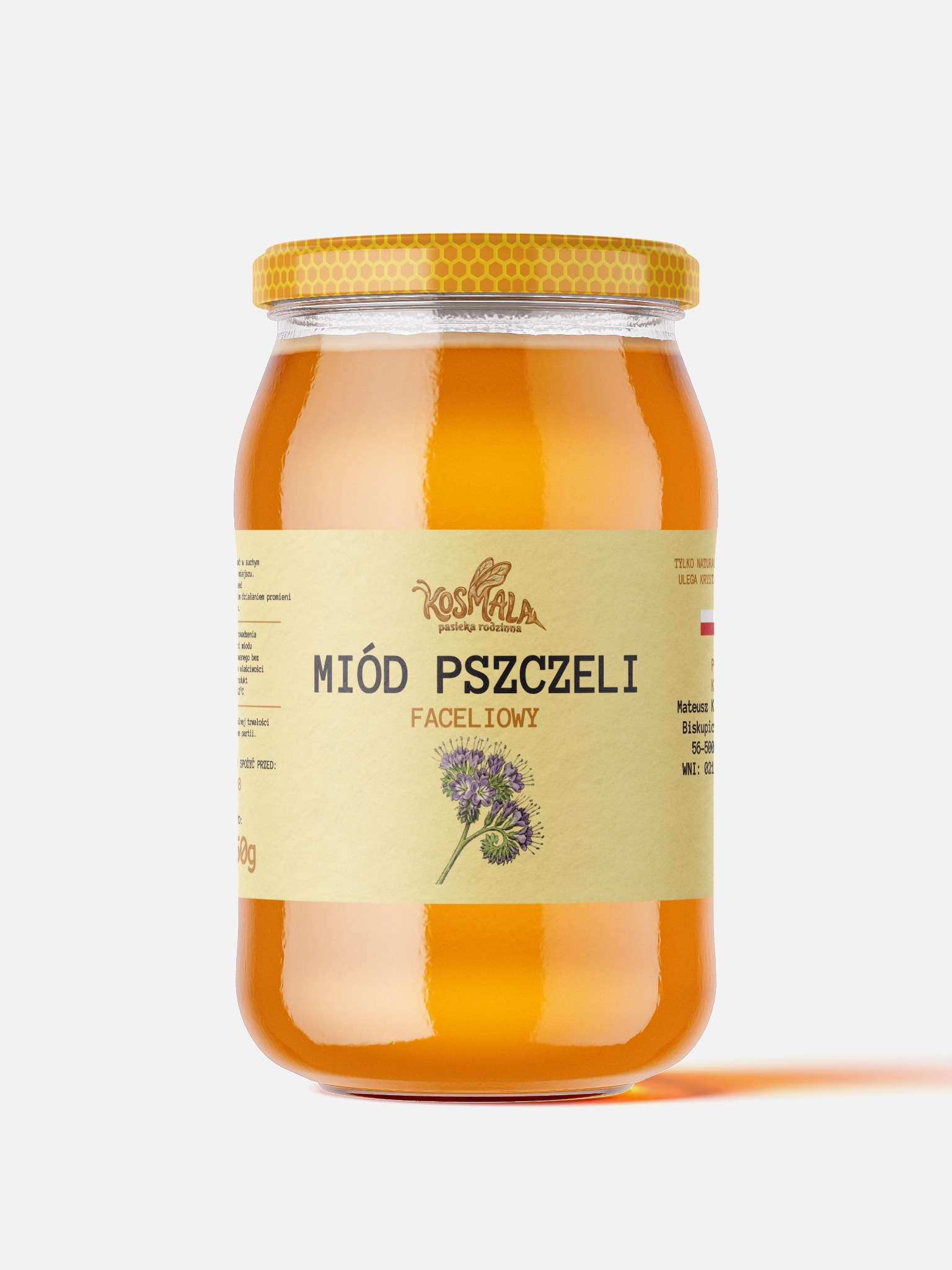 Słoik miodu faceliowego marki Kosmala z etykietą w odcieniach beżu, zamknięty żółtą zakrętką z wzorem plastra miodu, na jasnym tle. Produkt spożywczy.
