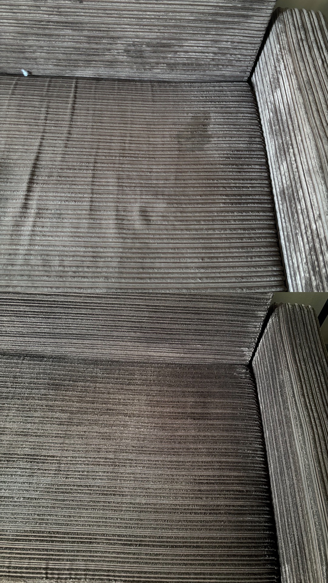 Fragment sofy z szarej, prążkowanej tkaniny, widoczny efekt czyszczenia - górna część jaśniejsza, dolna ciemniejsza.