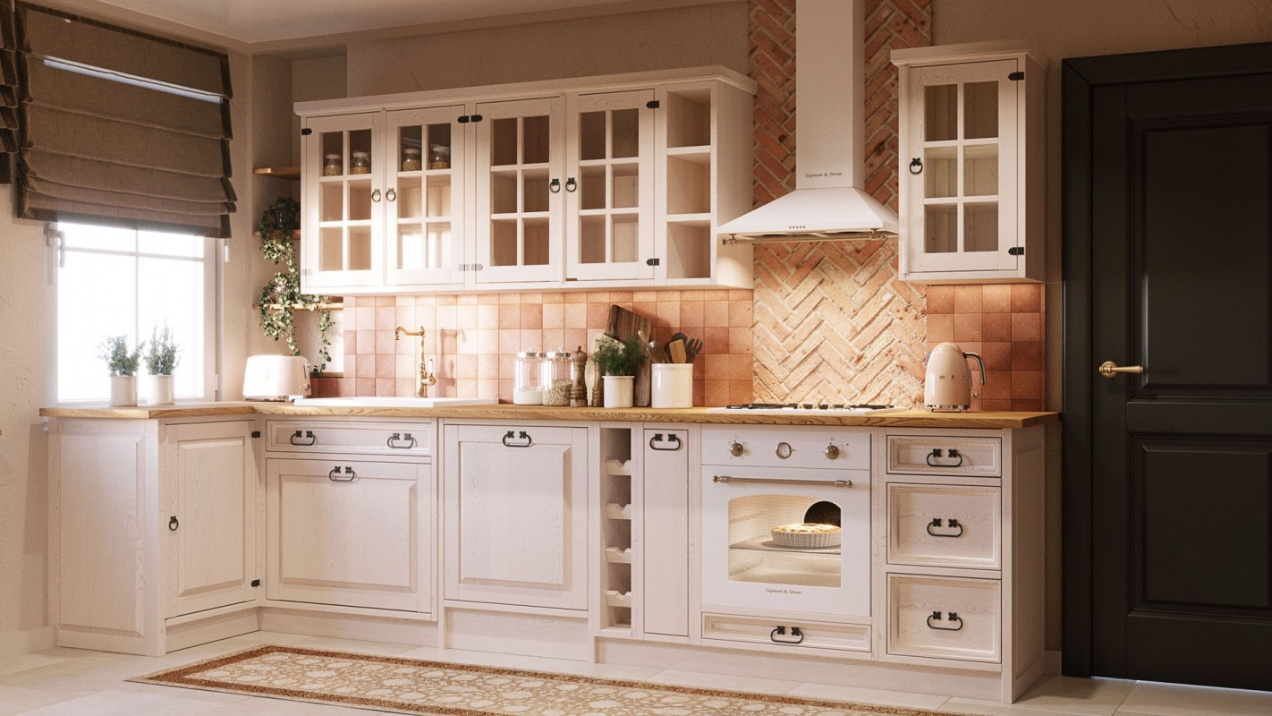 Jasna, klasyczna kuchnia z białymi szafkami, drewnianym blatem i ceglaną mozaiką na ścianie, widok na piekarnik z piekącym się ciastem.