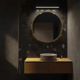 Nowoczesna łazienka z heksagonalnymi płytkami w odcieniach szarości, okrągłym lustrem z podświetleniem LED, drewnianą szafką pod umywalką i minimalistyczną armaturą.