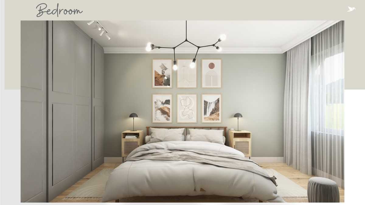 Jasna sypialnia z szarą zabudową szaf, łóżkiem z białymi poduszkami i narzutą, oraz sześcioma obrazami w drewnianych ramach nad wezgłowiem.