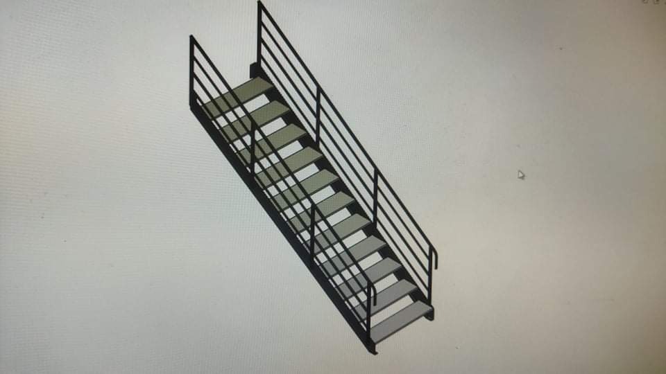 Wizualizacja 3D schodów metalowych z balustradą, widok z góry pod kątem, na jasnym tle ekranu komputera.