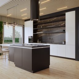 PKG3D Studio - Paweł Piotrowski - Nowoczesna kuchnia z wyspą, białymi szafkami i czarnym blatem z marmurowym wzorem, drewnianą podłogą, pionową ścianą z zieleni i designerskim oświetleniem.