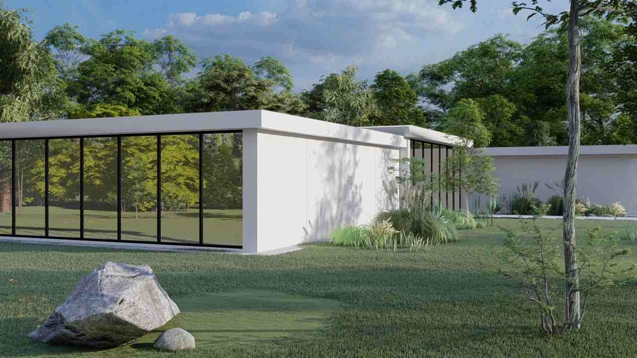 Nowoczesny dom modułowy z płaskim dachem i dużymi oknami, otoczony zielenią, z widocznym kamieniem na pierwszym planie.