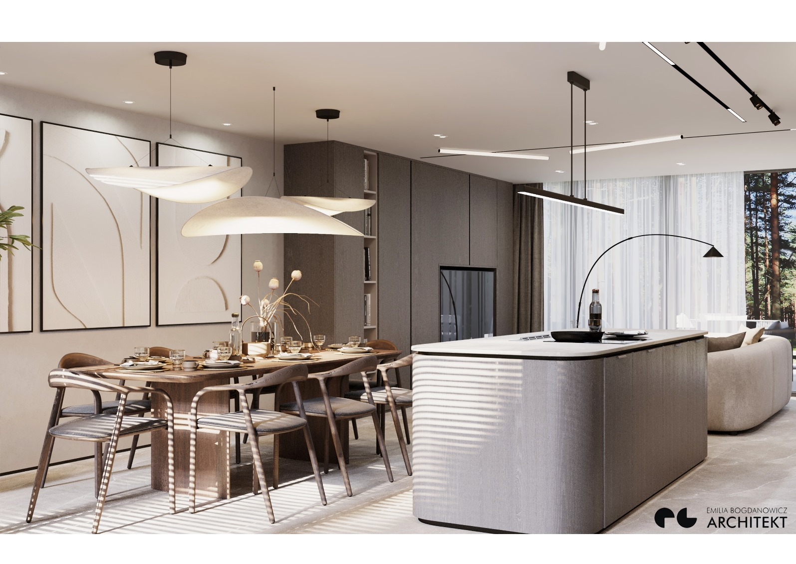 Nowoczesne wnętrze domu z jadalnią i wyspą kuchenną w odcieniach szarości i beżu, oświetlone designerskimi lampami wiszącymi i listwami LED, z widokiem na zalesiony krajobraz za oknem.