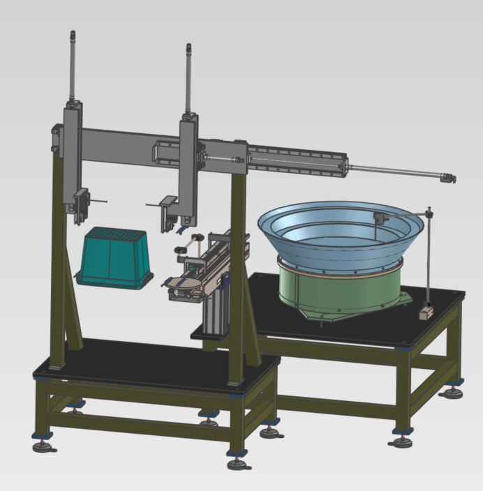 Wizualizacja 3D zautomatyzowanego stanowiska produkcyjnego z podajnikiem wibracyjnym i robotem kartezjańskim, prezentująca koncepcję projektową.