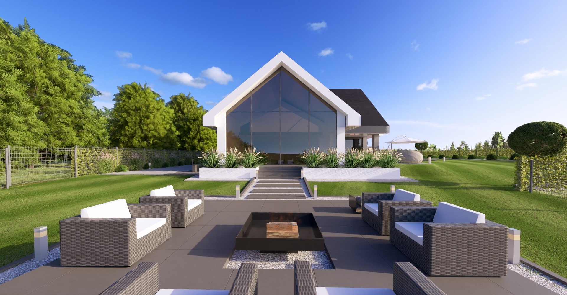 Nowoczesny dom z przeszkloną fasadą i tarasem z meblami ogrodowymi. Minimalistyczny design, zadbany trawnik i elementy małej architektury.