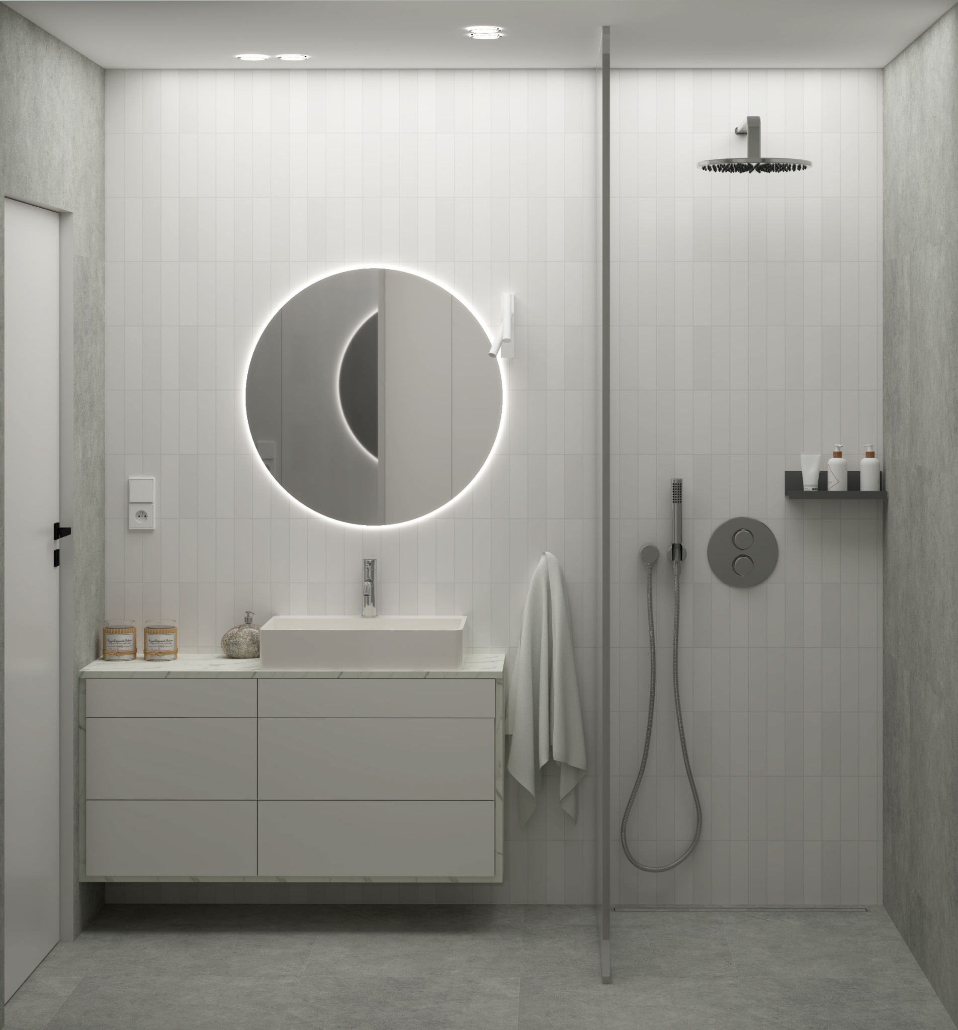 Nowoczesna łazienka w odcieniach szarości z podświetlanym okrągłym lustrem, minimalistyczną umywalką nablatową i szklaną kabiną prysznicową typu walk-in.