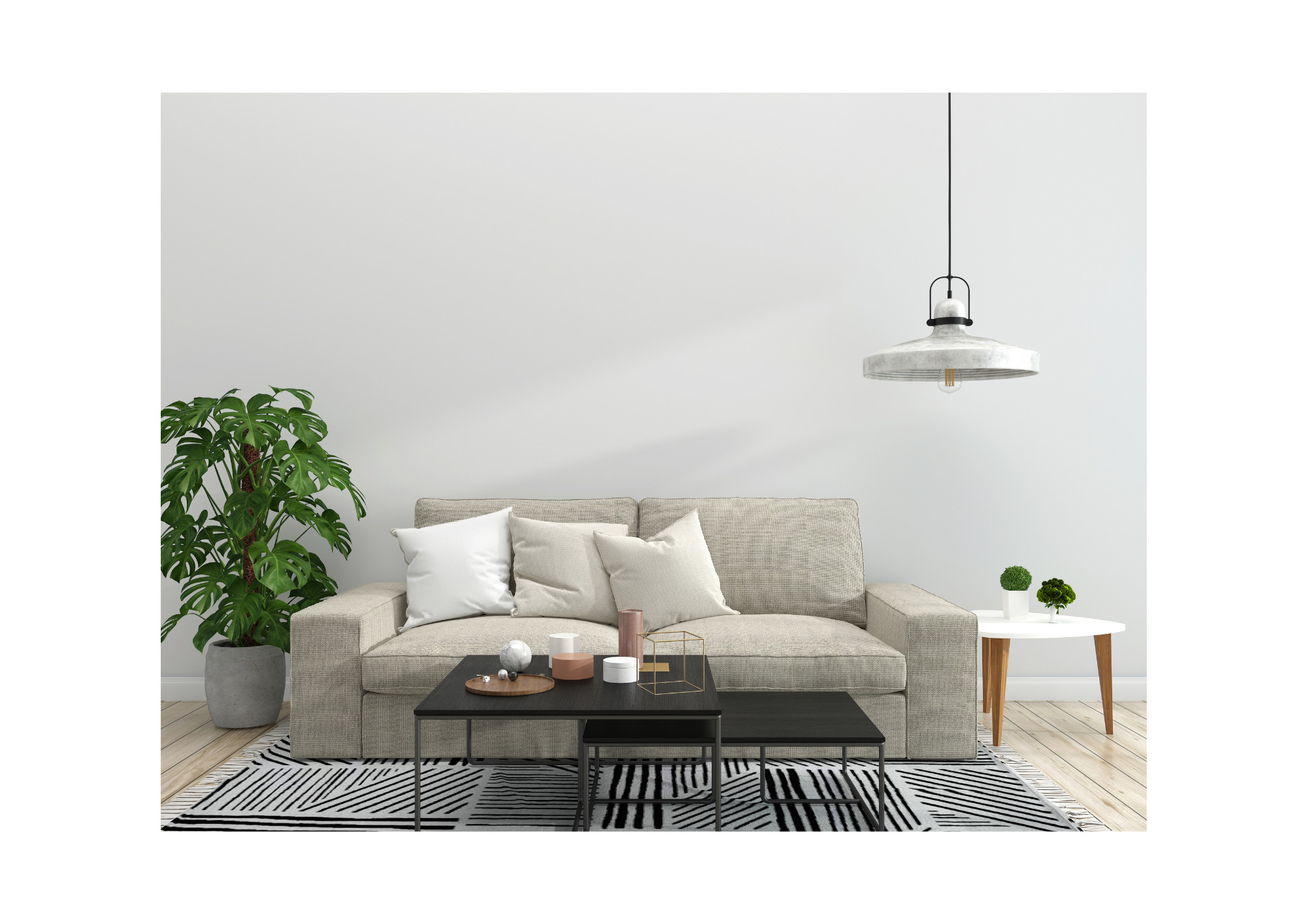 Jasna sofa z poduszkami, stoliki kawowe, roślina w szarej donicy i lampa wisząca w minimalistycznym salonie z drewnianą podłogą i czarno-białym dywanem.