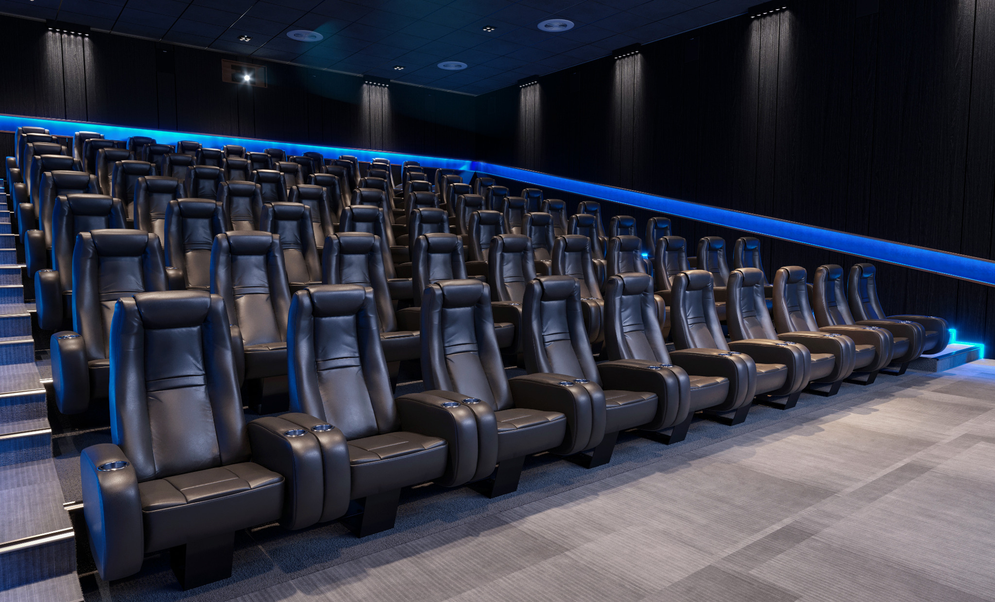 Wnętrze sali kinowej z rzędami czarnych, skórzanych foteli z uchwytami na napoje, oświetlonych niebieskim światłem LED.