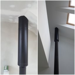 KOM-WENT Marcin Nowak - Czarny komin odprowadzający spaliny, widoczny fragment sufitu z niedokończonymi pracami gipsowymi oraz okna dachowe w jasnym pomieszczeniu.