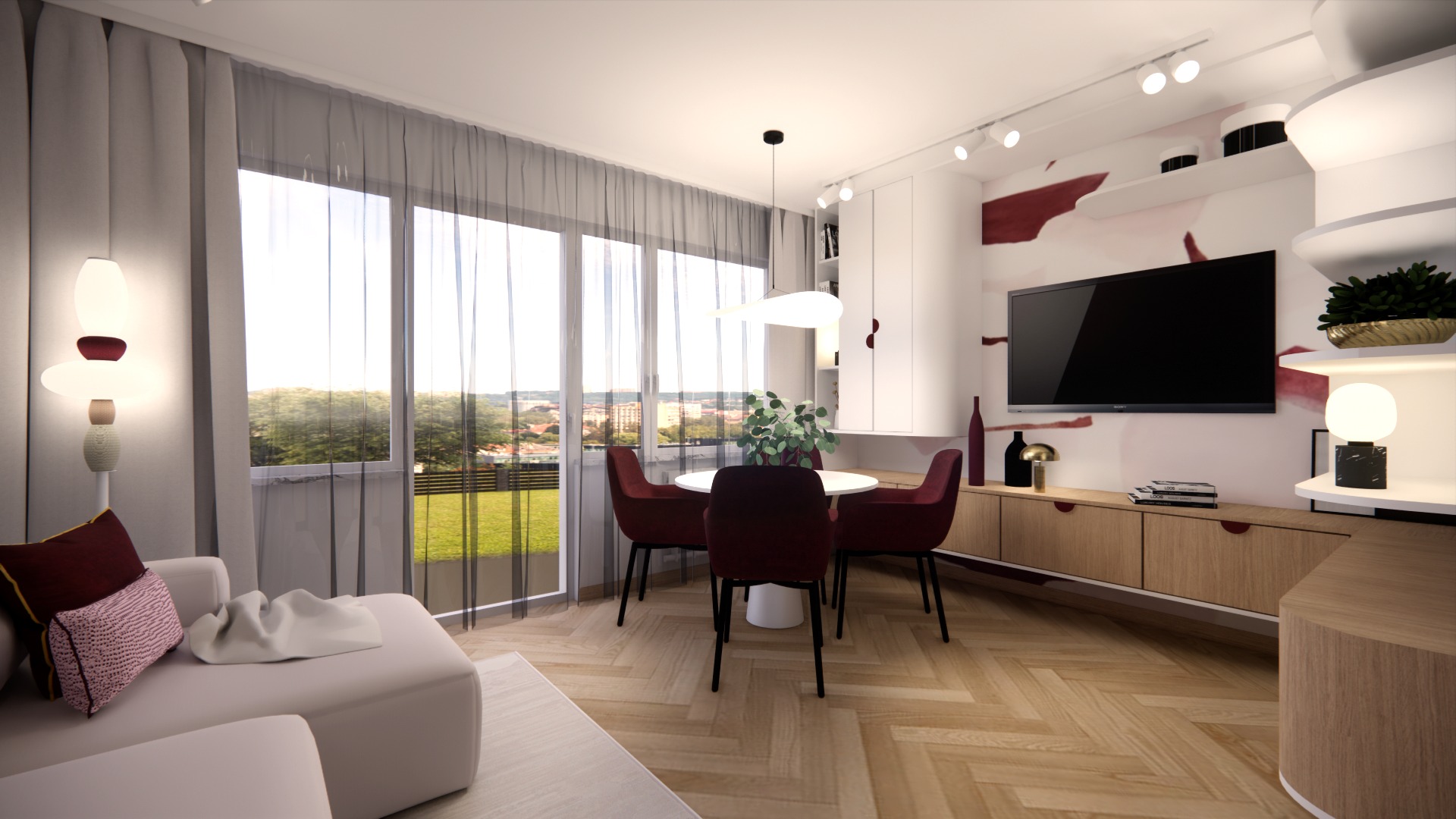 Jasne wnętrze z parkietem w jodełkę: sofa z poduszkami, okrągły stół z krzesłami, TV na ścianie z abstrakcyjnym wzorem. Duże okno z widokiem na zieleń.