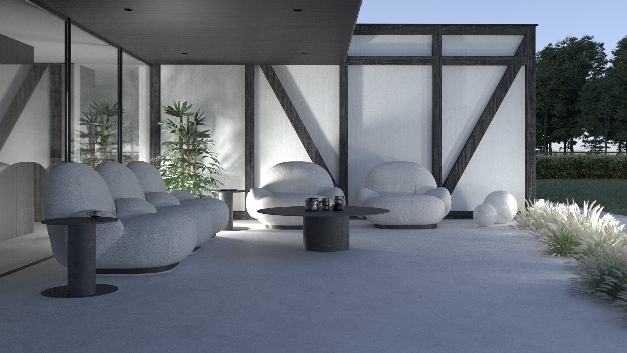 Zadaszony taras z sofą o zaokrąglonych kształtach, dwoma fotelami, stolikiem kawowym z zastawą, roślinami w donicach oraz dekoracyjnymi kulami, otoczony zielenią i elementami architektonicznymi...
